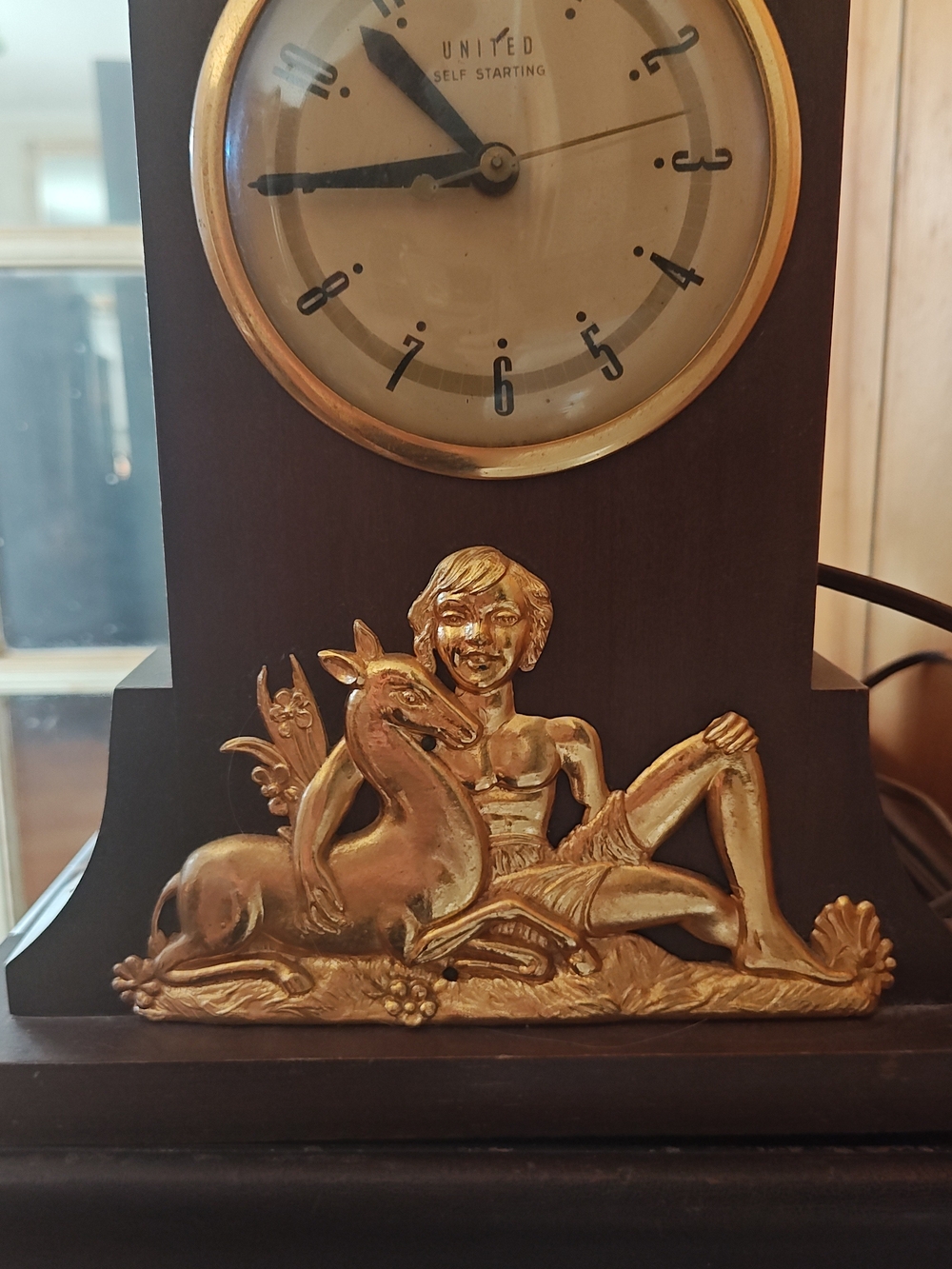 Gold Accent Wall Plaque with Figurine